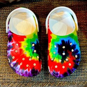 Like new CROCS rainbow-tie dyed design. Size 2